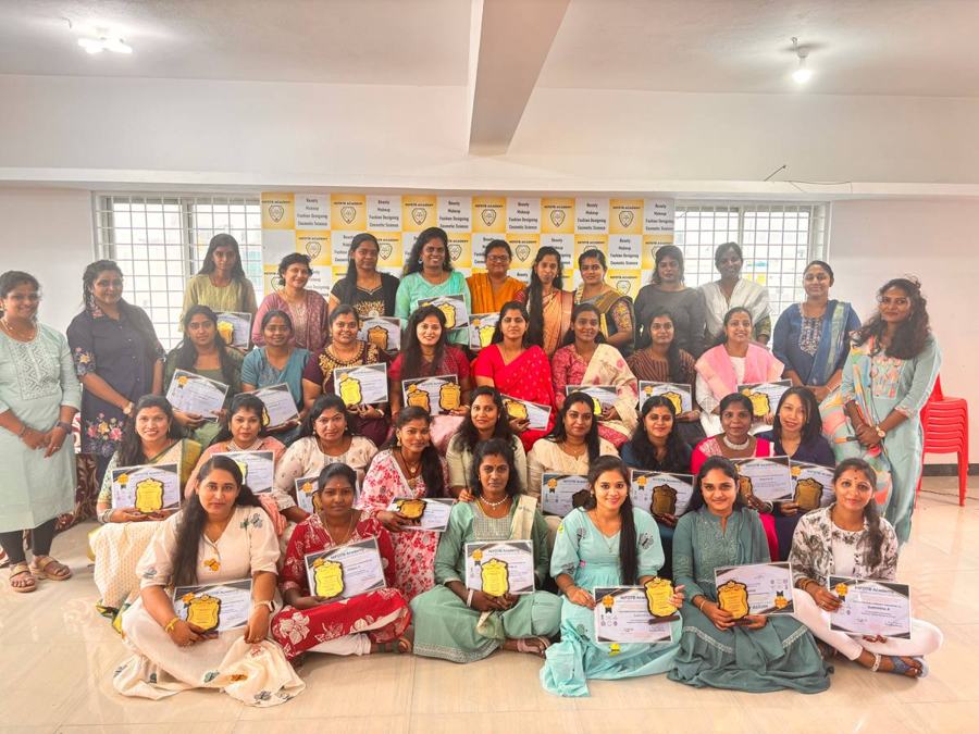 Students holding certificates and mementos