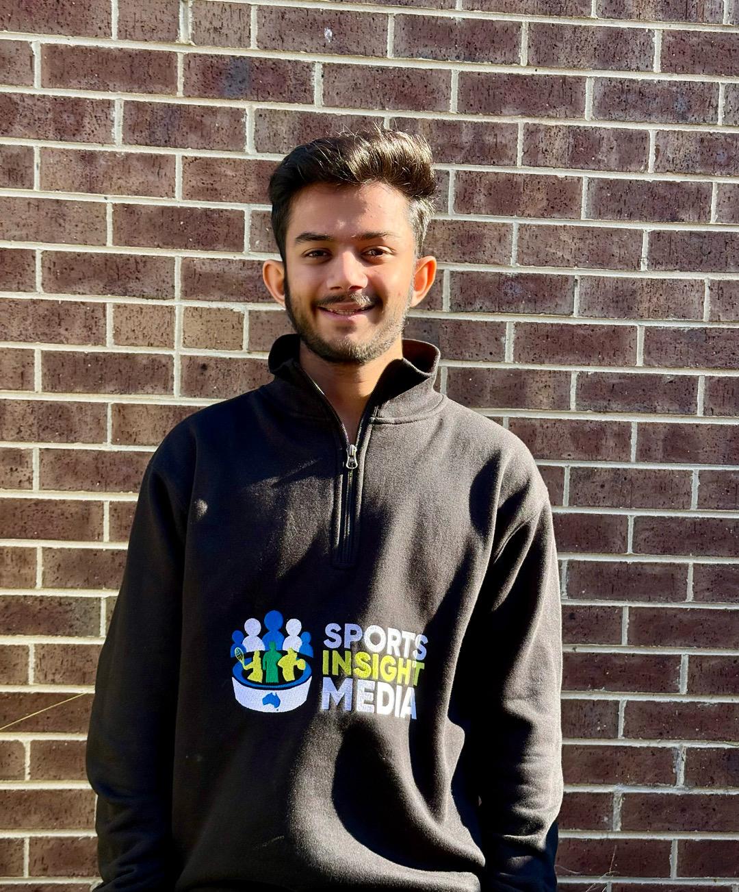 Jayneel Jasapara wearing his Sports Insight Media jumper