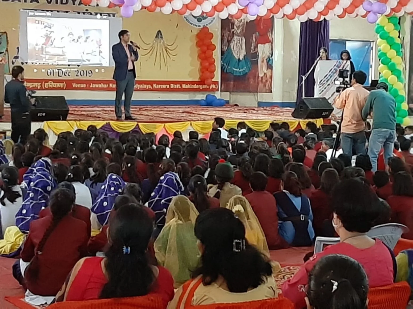 Ravi Yadav delivering a large school seminar