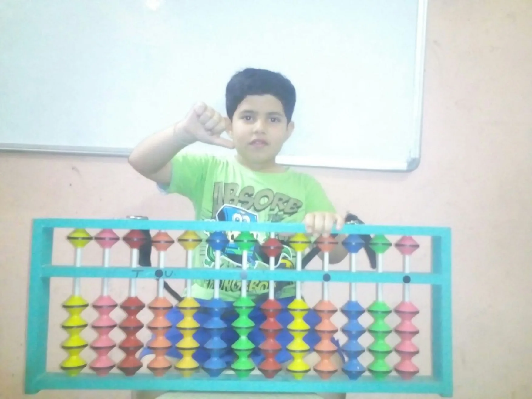 Student demonstrating Abacus calculation skill