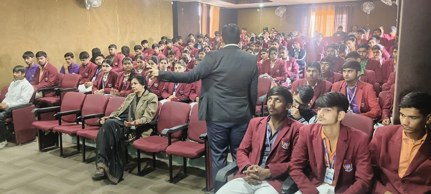Ravi Yadav interacting with students in a school workshop