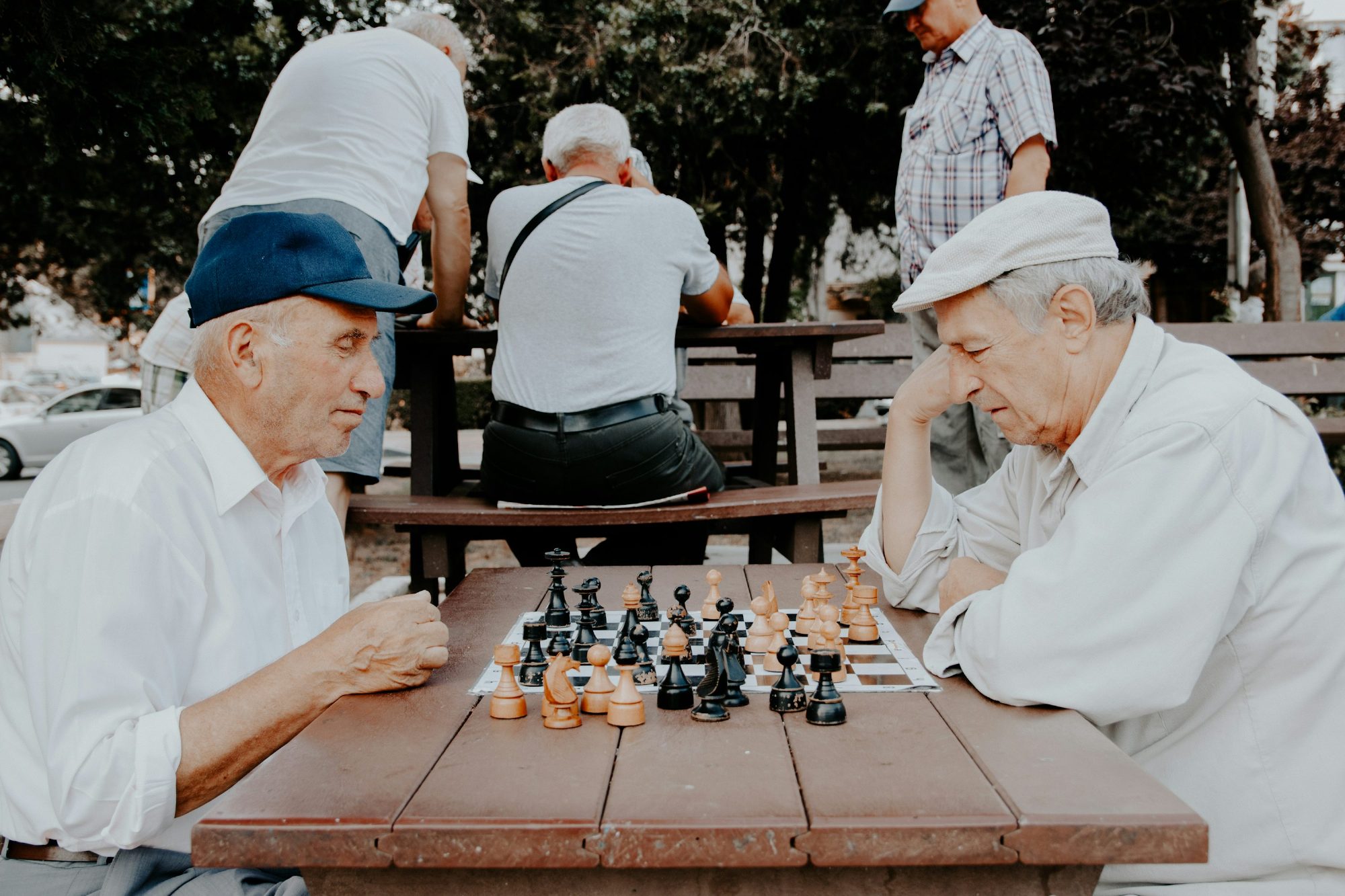 Two senior men enjoying a game of chess
