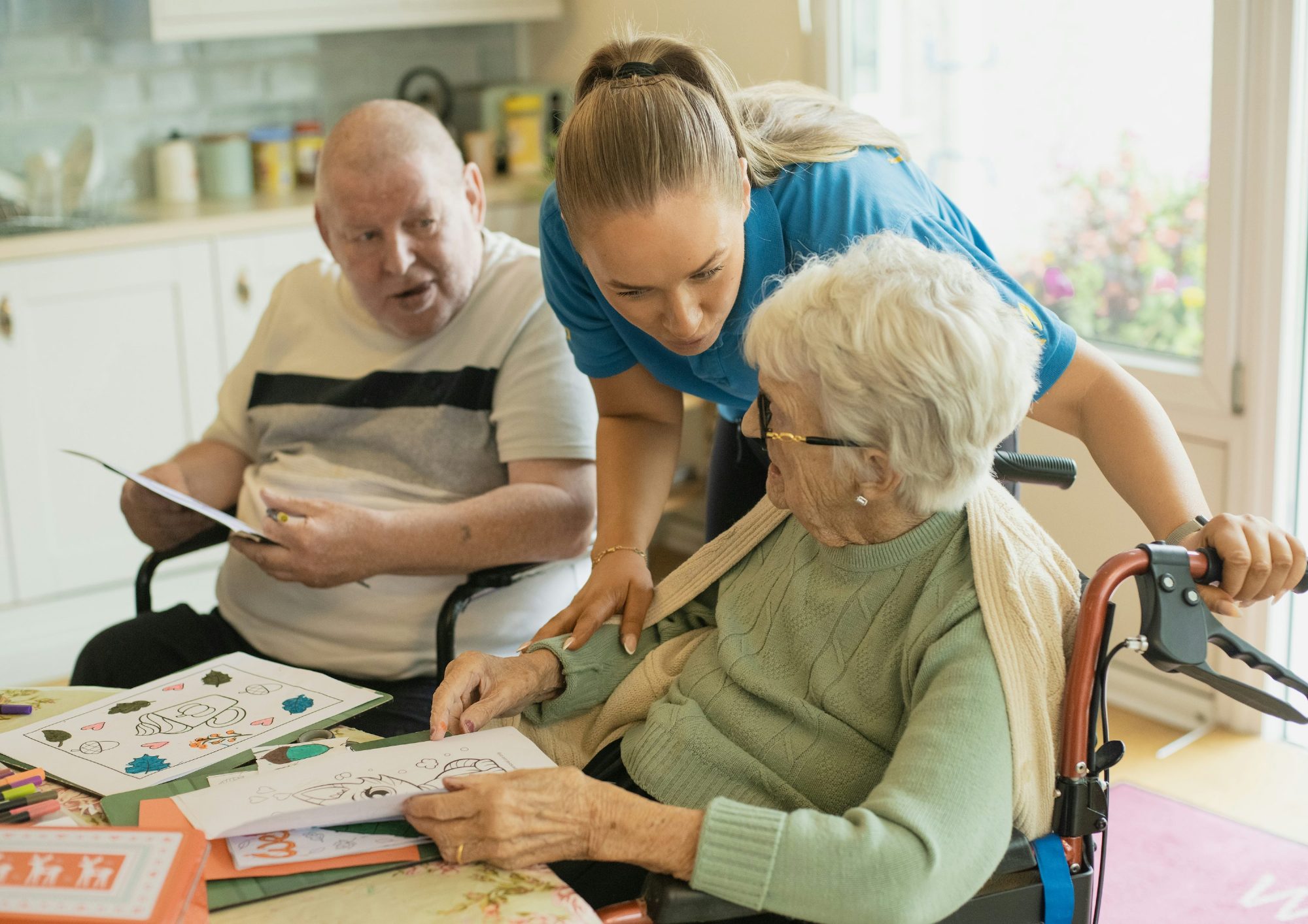 Caregiver enjoying an activity with residents