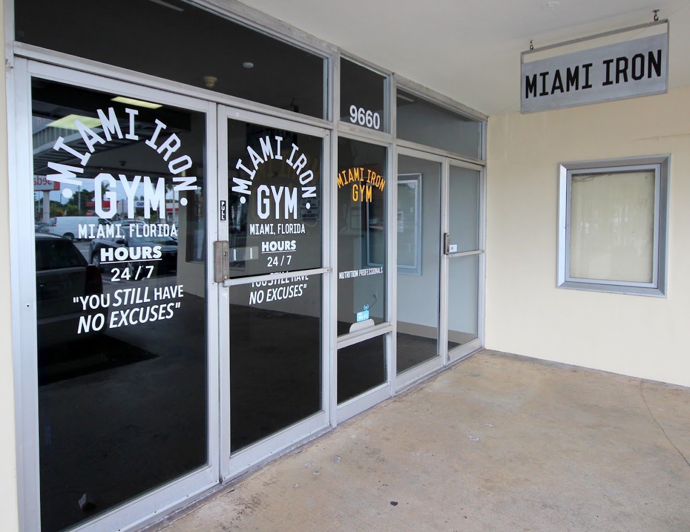 Miami Iron Gym storefront doors at 9660 Coral Way — Open 24/7, You still have no excuses