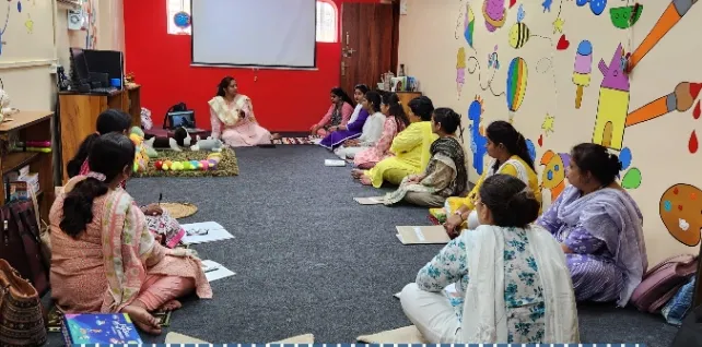 Educators sitting in a circle during a Kosha Shiksha session