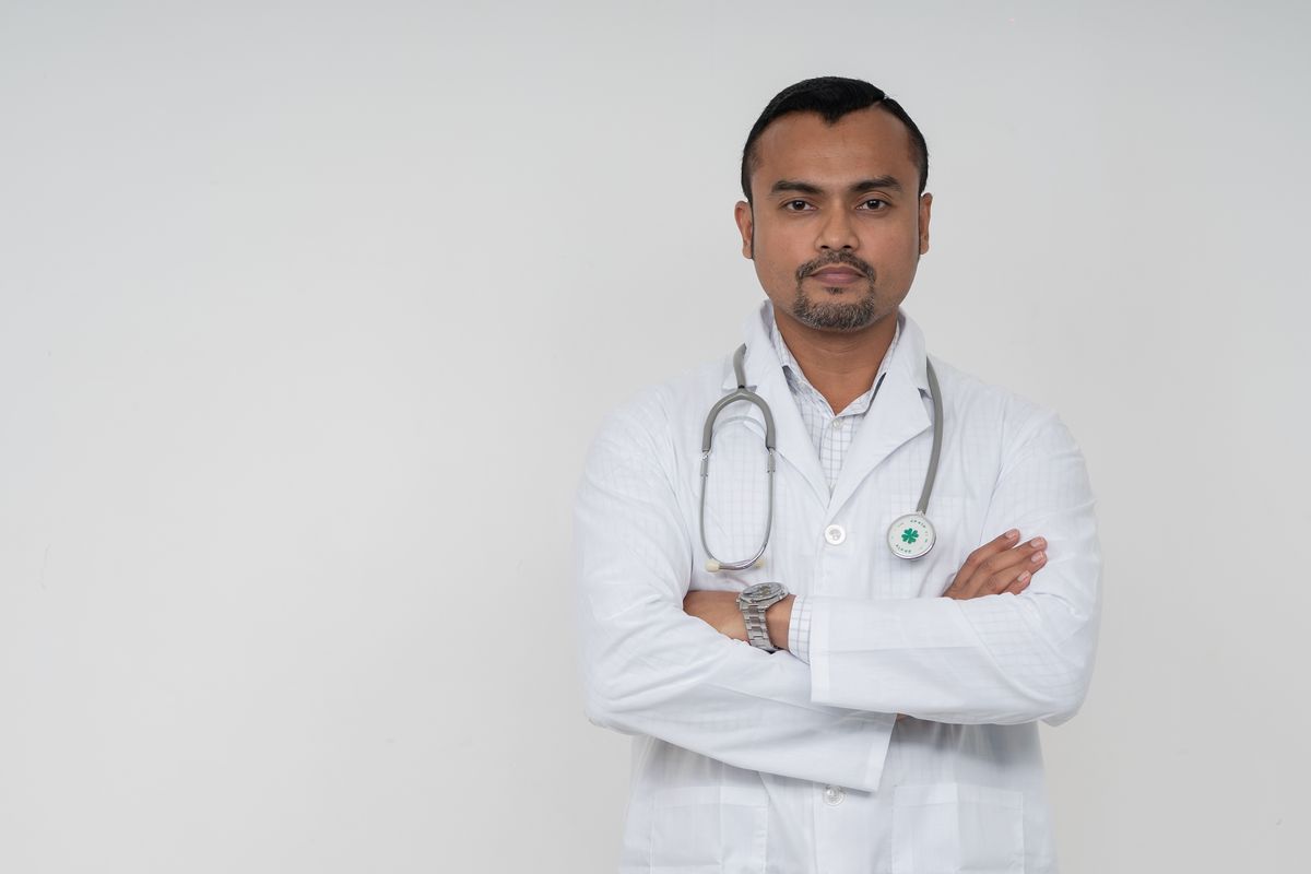 Doctor in white coat at a clinic