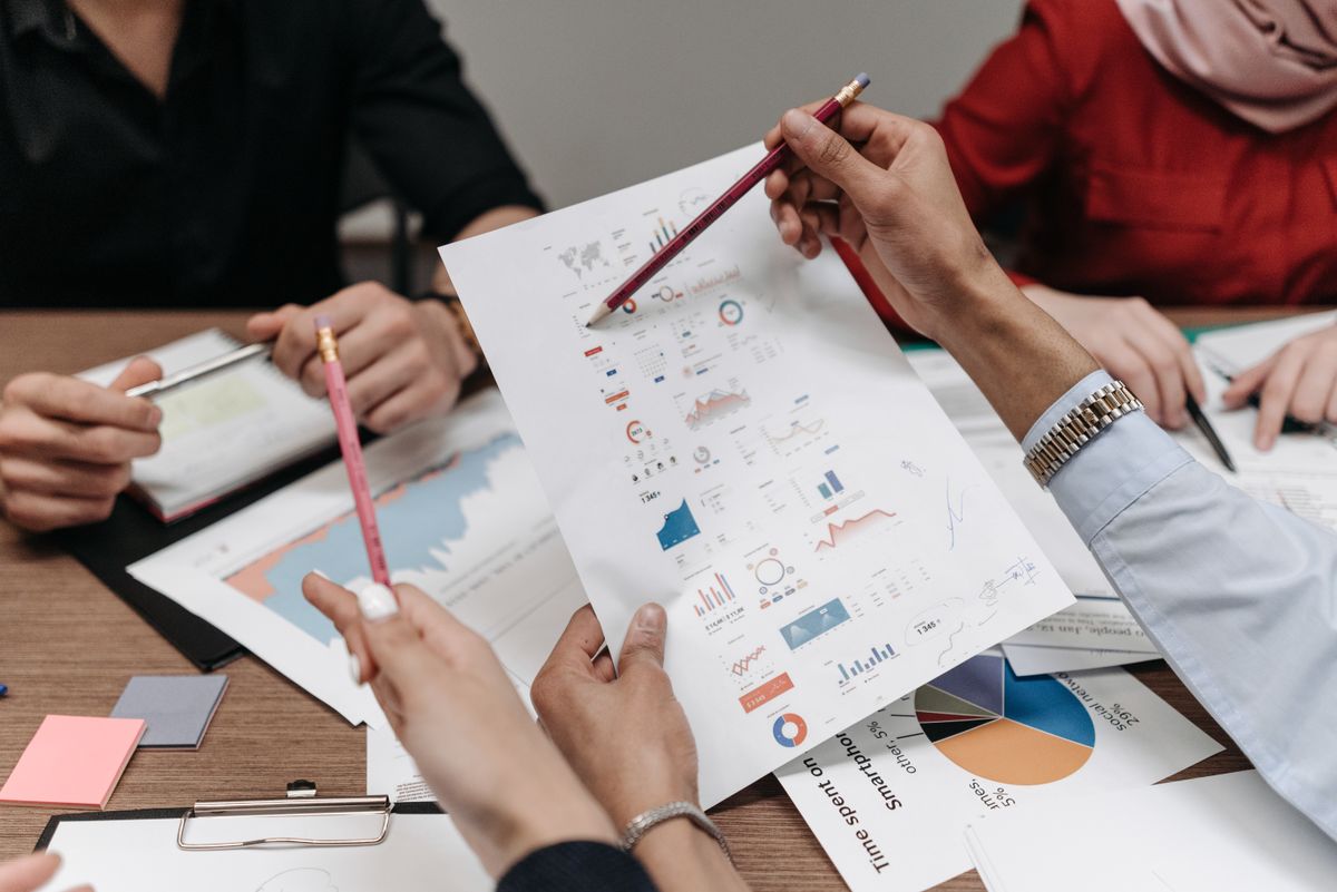Brandkrity team reviewing marketing performance reports