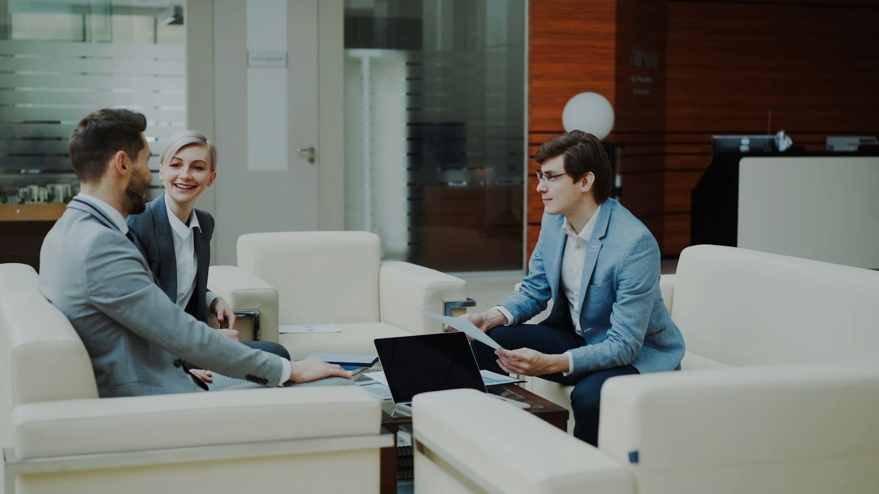 Professionals reviewing business operations