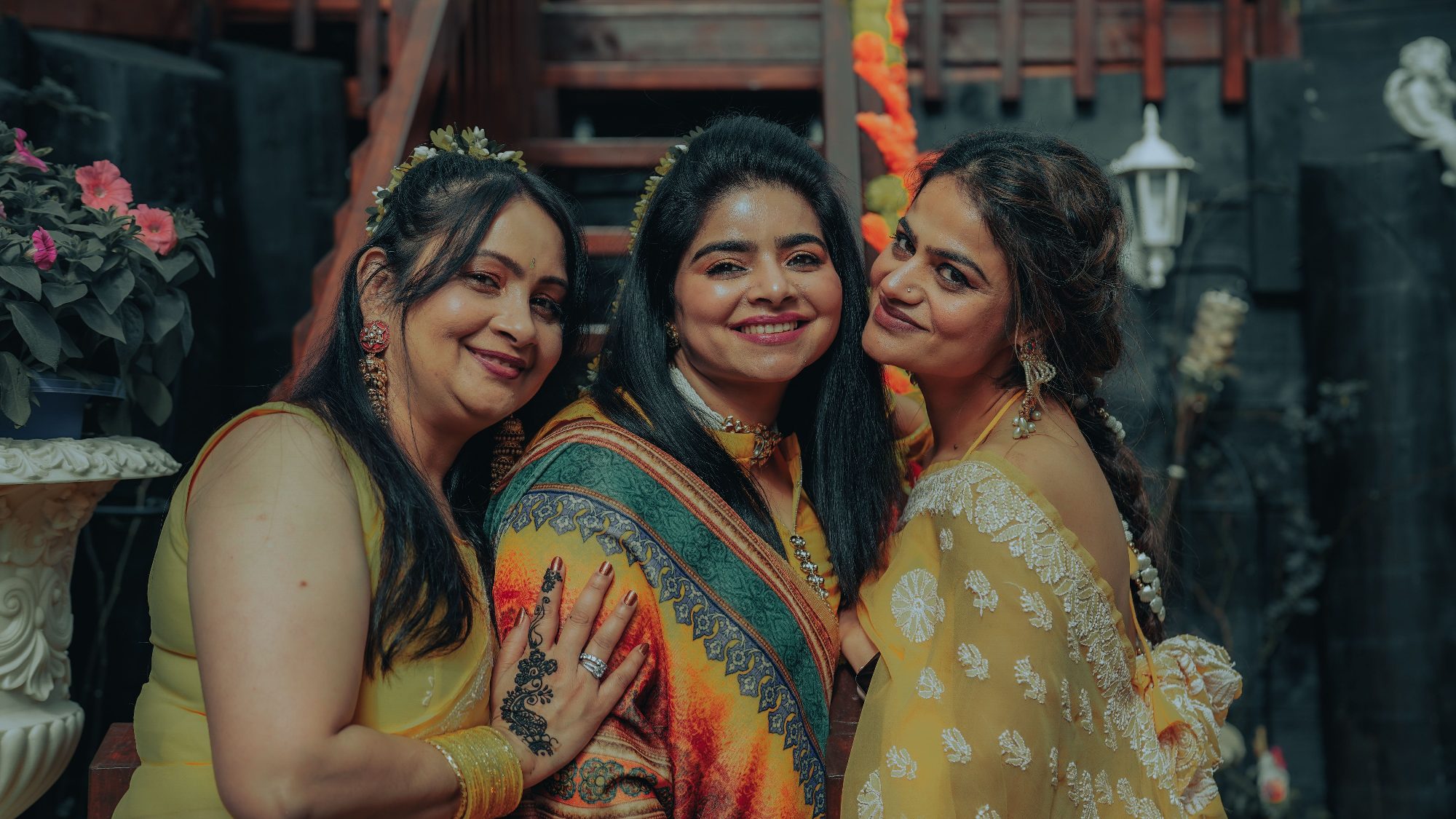 Three women smiling together