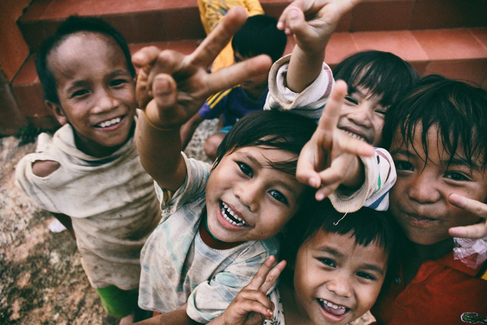 Children gathered in a supportive environment